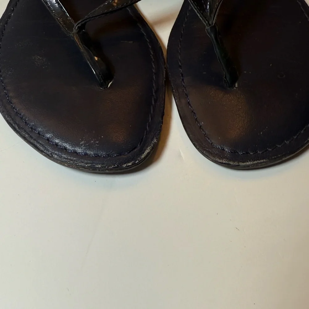 Tory Burch Black Thong Sandals with Gold Logo